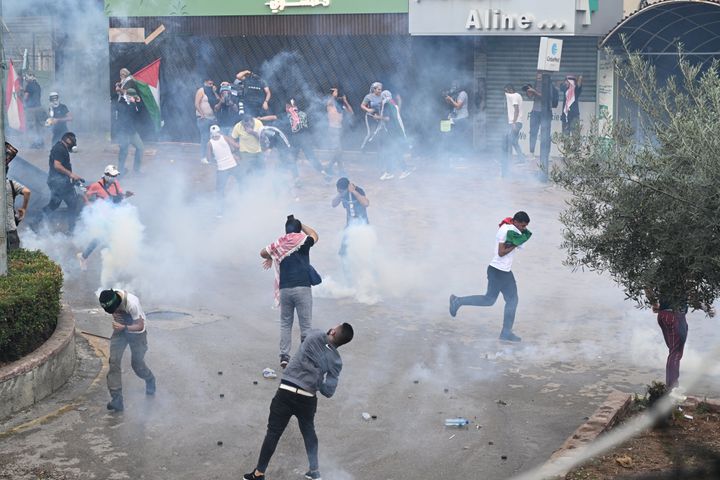 Security forces intervene with tear gas to Palestinian refugees and Lebanese during the demonstration in solidarity with Gaza and condemnation of Israel after protesters try to cross the barbed wire in front of the US Embassy in Beirut.