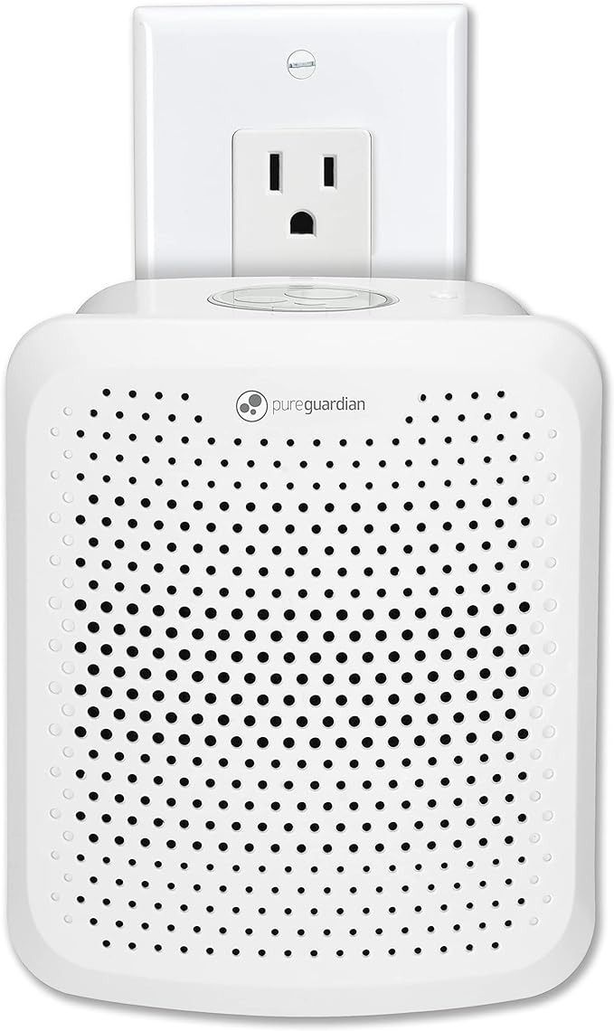 A plug-in Germ Guardian air purifier with nightlight