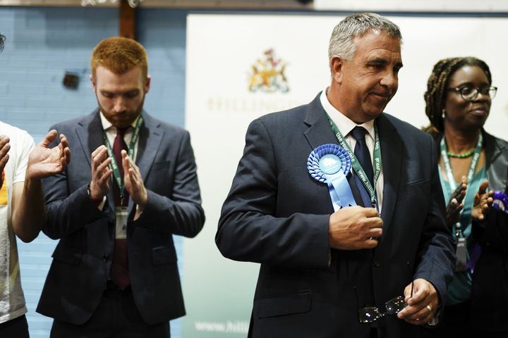 Winning Conservative candidate Steve Tuckwell with Labour candidate Danny Beales (left) 