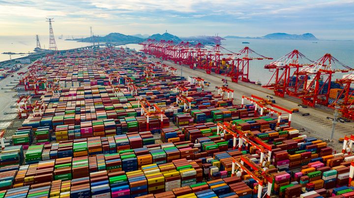 A number of very large container ships carry out container handling operations at the automated terminal of Yangshan deep-water Port, Shanghai, China, July 21, 2023. 