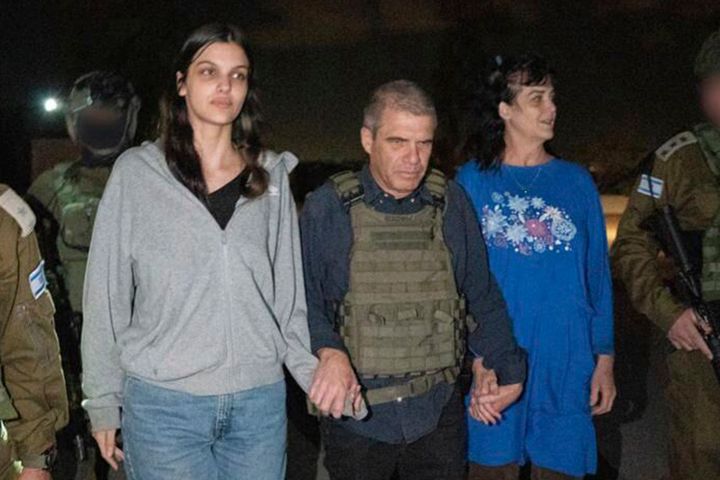 In this photo provided by the Government of Israel, Judith Raanan, right, and her 17-year-old daughter Natalie are escorted by Israeli soldiers and Gal Hirsch, Prime Minister Benjamin Netanyahu's special coordinator for returning the hostages, as they return to Israel from captivity in the Gaza Strip, Friday, Oct. 20, 2023. Hamas released the pair in what it said was a goodwill gesture late Friday, nearly two weeks after they were captured in a bloody cross-border raid by the Islamic militant group. The Hamas attack sparked a war that is entering its third week, and Hamas is believed to still be holding some 200 people hostage. (Government of Israel via AP Photo)