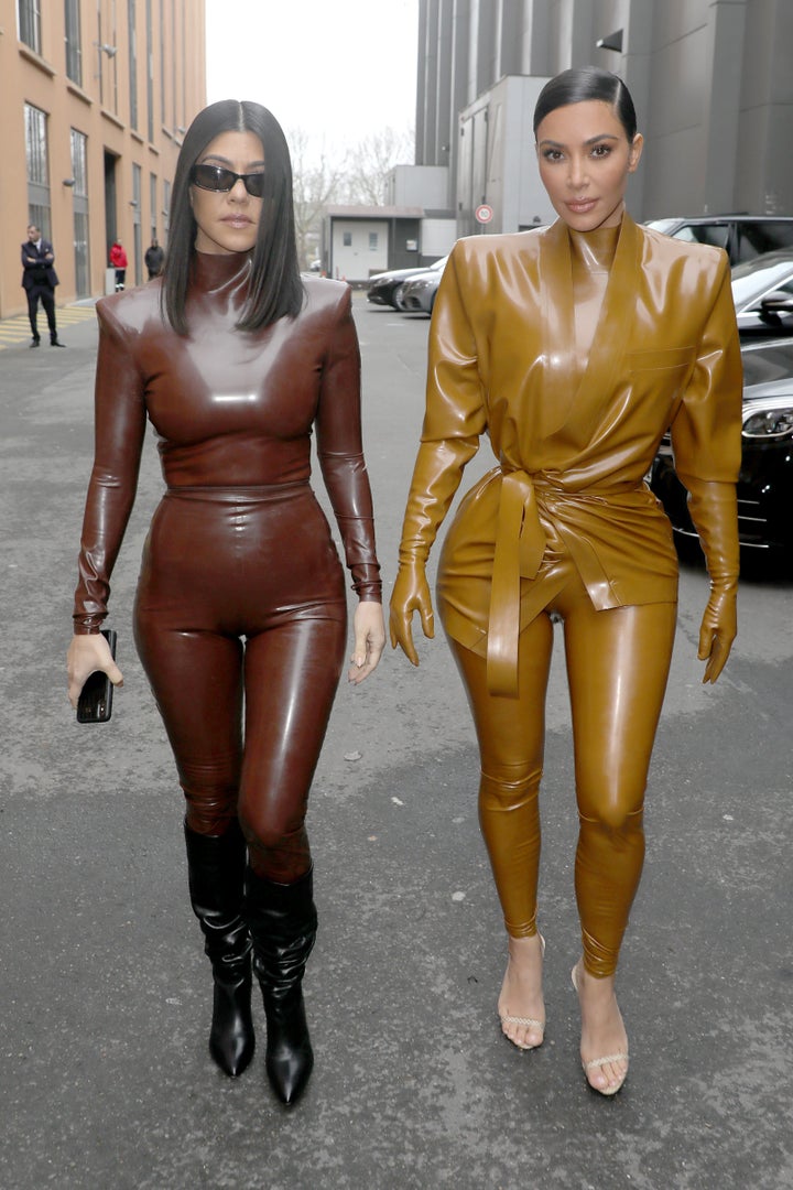 Kourtney and Kim Kardashian photographed at the Balenciaga show on March 1, 2020 in Paris, France. The oldest Kardashian sister recently reflected on past disagreements with her sister in a birthday tribute posted on social media. 