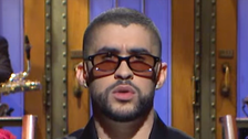 Bad Bunny Makes Sharp Jab At Grammys Closed-Captioning Controversy In ‘SNL’ Monologue