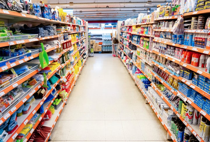 Variety of cleaning products on the shelfs at the supermarket - No people