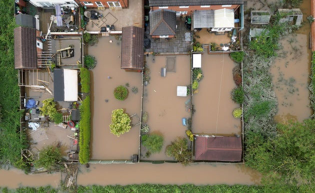 Gardens remain flooded as high water levels begin to recede after Storm Babet flooded homes, business and roads in Retford.