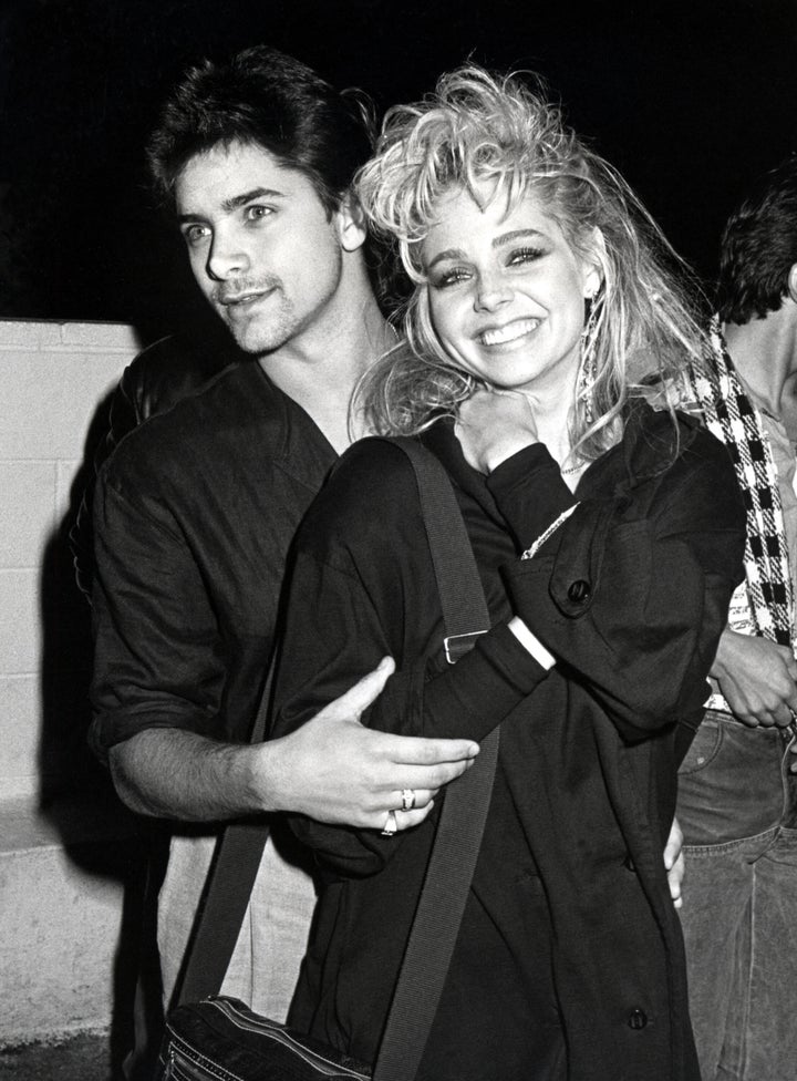 John Stamos and Teri Copley arrive at a party for Hall & Oates on Dec. 17, 1984. Stamos says Copley cheated on him with Tony Danza in his memoir "If You Would Have Told Me This."