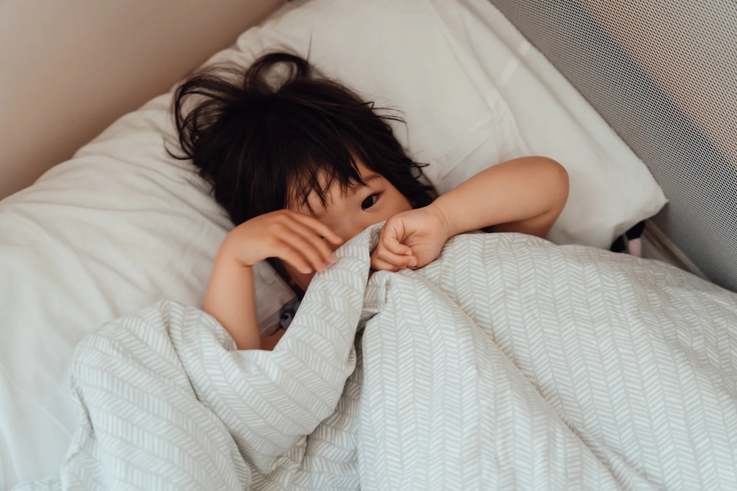 Child sleeping for Vitabiotics clock change health tips in Huffington Post