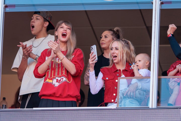 Taylor Swift watches the game with Brittany Mahomes (right, with the baby) on Oct. 22 at Arrowhead Stadium in Kansas City, Missouri.