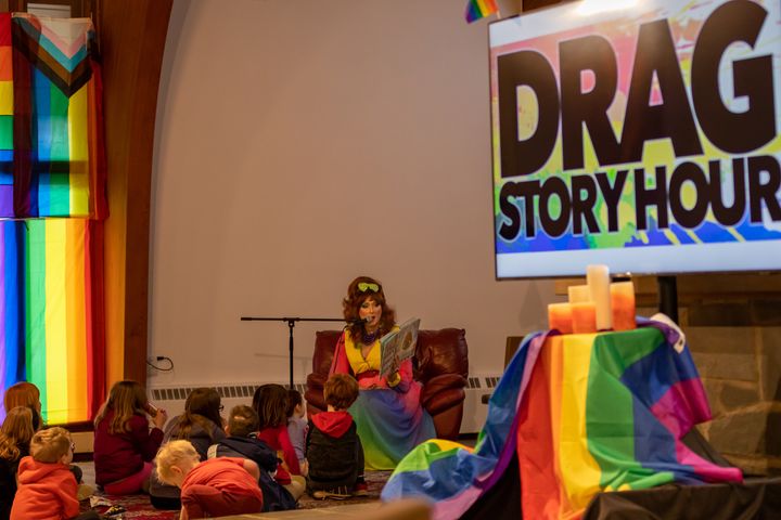 A drag queen reads a children's book at the Community Church of Chesterland in Chesterland, Ohio, on April 1 amid heightened security.