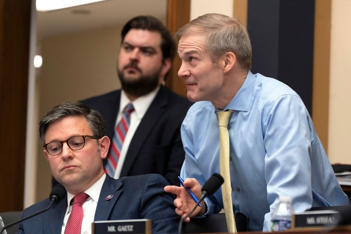 Rep. Jim Jordan (R-Ohio), right, talks to Rep. Mike Johnson (R-La.) during a House Judiciary subcommittee hearing on March 9. After several failed bids to replace Kevin McCarthy as House speaker, including one by Jordan, the latest name at the top of the list is Johnson's.