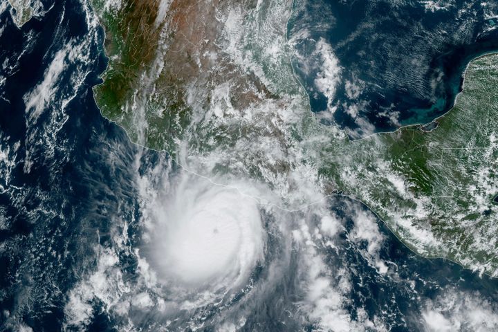 This satellite image provided by NOAA on Tuesday, Oct. 24, 2023, shows Hurricane Otis approaching Mexico's Pacific coast near Acapulco. Otis is forecast to make landfall early Wednesday and there is a hurricane warning in effect from Punta Maldonado to Zihuatanejo. (NOAA via AP)
