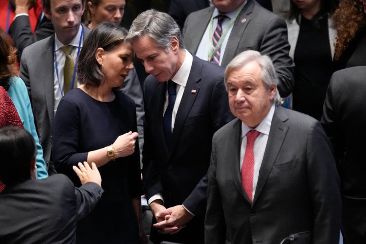 German Foreign Minister Annalena Baerbock, left, talks with United States Secretary of State Antony Blinken, center, before the start of a Security Council meeting at United Nations headquarters, Tuesday, Oct. 24.