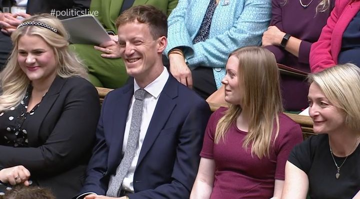 Labour's new MP Alistair Strathern laughs as Rishi Sunak welcomes him to the Commons.
