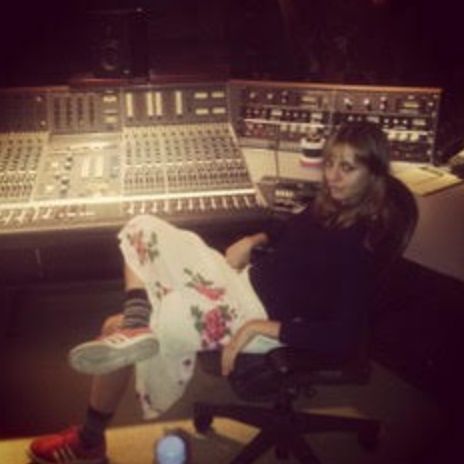 The author is pictured at a recording session for a song she wrote about The Man in 2015.