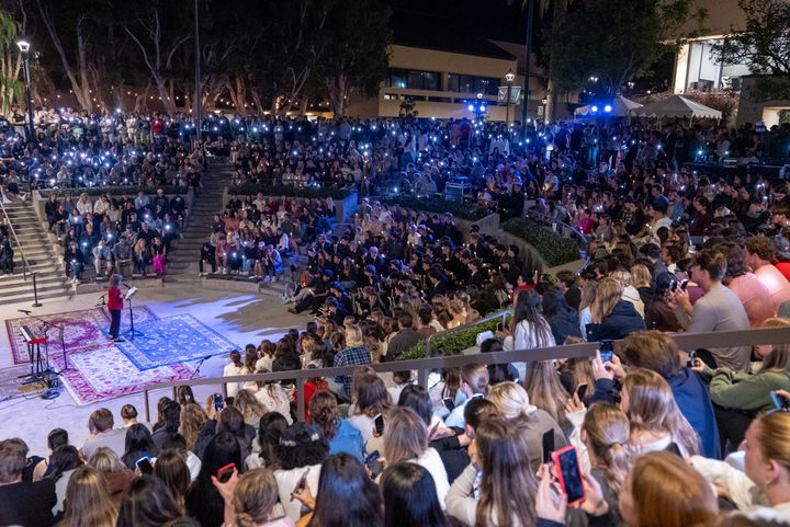 Students from Pepperdine University gather at a candlelight vigil honoring Niamh Rolston, Peyton Stewart, Asha Weir and Deslyn Williams. The university said the four seniors will be given posthumous degrees.