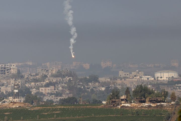 A picture taken from the southern Israeli city of Sderot on Oct. 26, 2023, shows flares fired by the Israeli army over the northern Gaza Strip, amid the ongoing war with the Palestinian group Hamas.