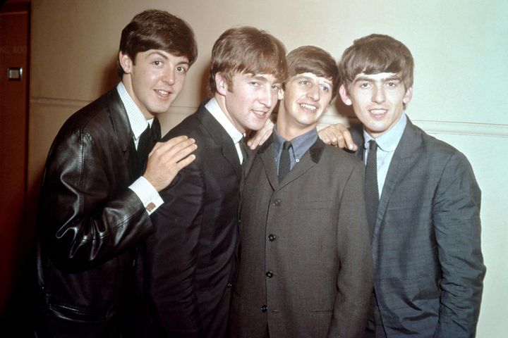 The Beatles pose for a portrait in 1963