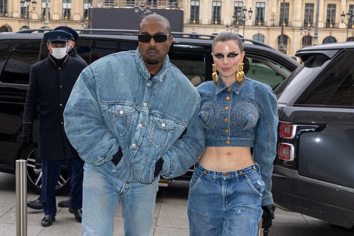 Kanye West and Julia Fox wearing matching denim in Paris in 2022 — which is a remarkably tame outfit for Fox.
