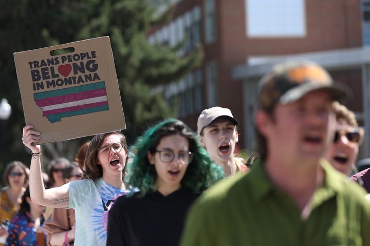 Transgender rights activists march through the University of Montana campus on May 3 in Missoula, Montana. Dozens were protesting the censure of transgender Montana state Rep. Zooey Zephyr (D), who was blocked from speaking after she said state legislators would have "blood on your hands" if a transgender youth care ban was passed.