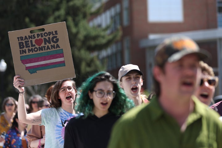 Transgender rights activists march through the University of Montana campus on May 3 in Missoula, Montana. Dozens were protesting the censure of transgender Montana state Rep. Zooey Zephyr (D), who was blocked from speaking after she said state legislators would have "blood on your hands" if a transgender youth care ban was passed.