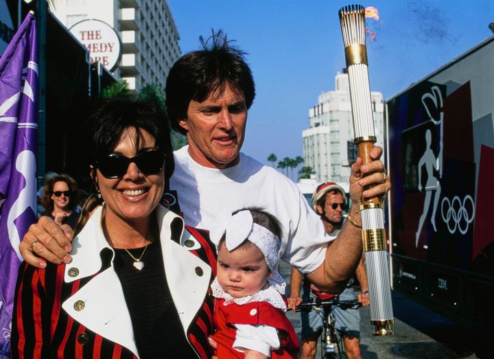 Kris Jenner (left) alongside Caitlyn Jenner (then known as Bruce Jenner) and daughter Kendall Jenner.
