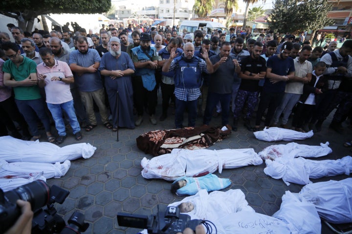 Al Jazeera journalist Wael Dahdouh attends a funeral ceremony for his wife, son, daughter, and other people on Oct. 26, 2023, after they were killed in an Israeli airstrike.