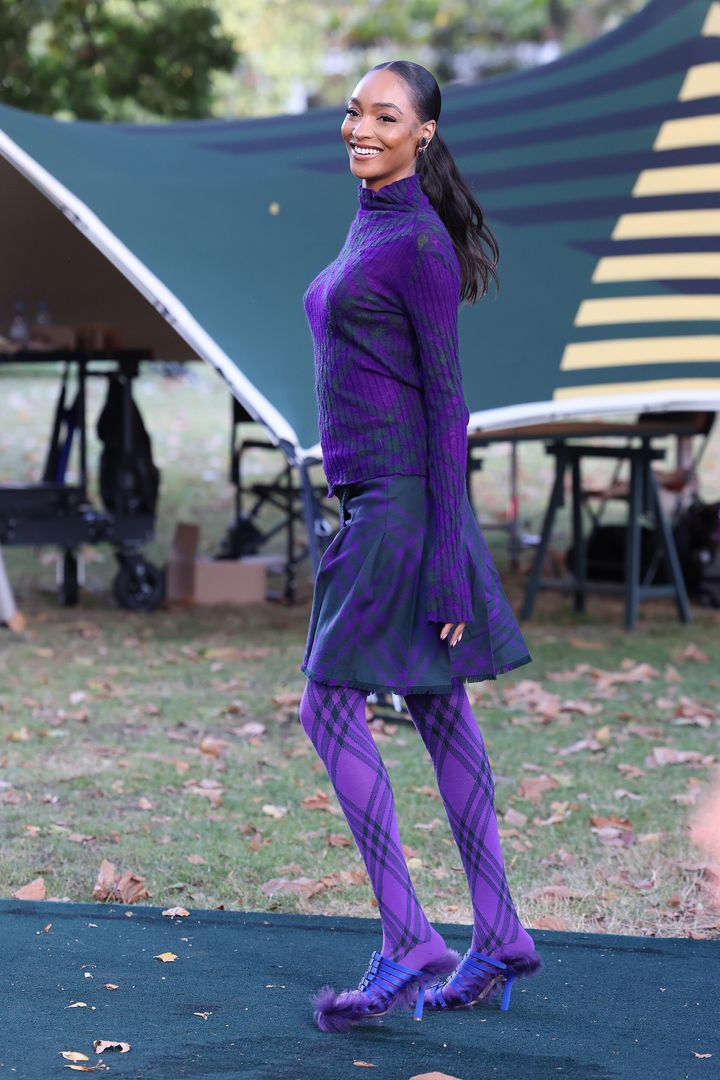 Model Jourdan Dunn wears purple patterned tights at London Fashion Week in September. 