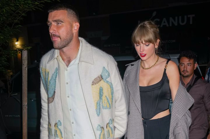 Travis Kelce and Taylor Swift are photographed leaving a Saturday Night Live after-party on Oct. 15 in New York.