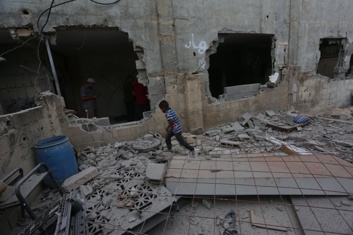 Civilians inspect Palestinian Hassan Katanani's 2-storey house, where his family lives, after Israeli army demolished the house by planting explosives in Nablus, West Bank on October 29, 2023. (Photo by Nedal Eshtayah/Anadolu via Getty Images)