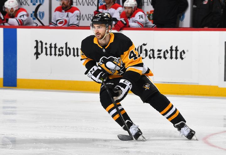 Adam Johnson played in the National Hockey League with the Pittsburgh Penguins as a forward from 2018 to 2020. (Photo by Joe Sargent/NHLI via Getty Images)