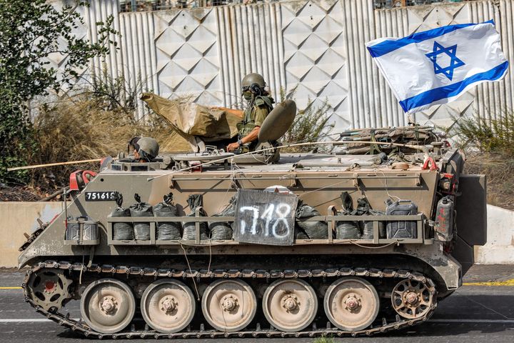 An Israeli army tracked medical vehicle moves along a road near the northern town of Kiryat Shmona close to the border with Lebanon on Oct. 31, 2023, amid increasing cross-border tensions between Hezbollah and Israel as fighting continues in the south with Hamas militants in the Gaza Strip. 
