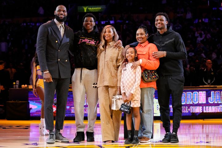 LeBron James and his family at a ceremony honoring him as the NBA's all-time leading scorer in February.