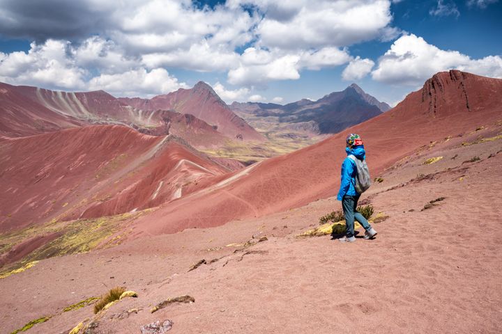 Located near Cusco city, the Red Valley lies behind the Rainbow Mountain in the district of Pitumarca