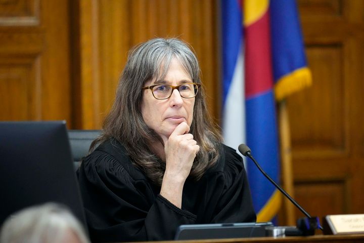 Judge Sarah B. Wallace presides over a hearing for a lawsuit to keep former President Donald Trump off the state ballot in court on Nov. 1, 2023, in Denver. 