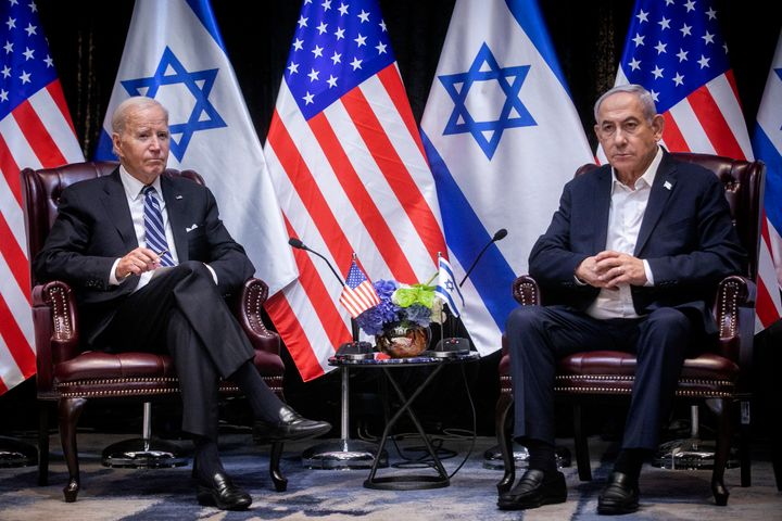 U.S. President Joe Biden, left, pauses during a meeting with Israeli Prime Minister Benjamin Netanyahu, right, in Tel Aviv, Israel, Wednesday, Oct. 18, 2023. (Miriam Alster/Pool Photo via AP)