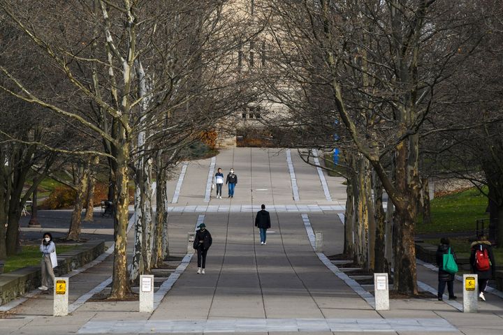 Students are seen walking at Cornell University in Ithaca, New York. The school announced that all classes will be canceled on Friday for a "community day."