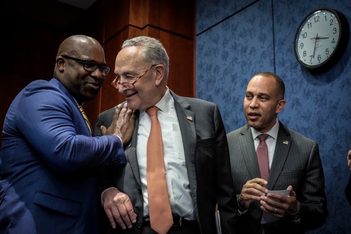 Rep. Jamaal Bowman (D-N.Y.), left, greets Senate Majority Leader Chuck Schumer (D-N.Y.), center, and House Minority Leader Hakeem Jeffries (D-N.Y.) in February.