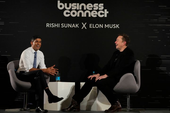 Tesla and SpaceX's CEO Elon Musk laughs during the in-conversation event with Rishi Sunak.