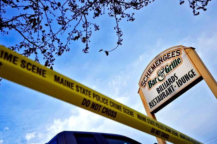 Crime scene tape still surrounds Schemengees Bar & Grille, Sunday, Oct. 29, 2023, in Lewiston, Maine. The community is working to heal following shooting deaths of 18 people at the bar and a bowling alley in Lewiston on Wednesday. (AP Photo/Matt York)