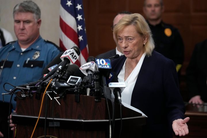 Maine Gov. Janet Mills, right, faces reporters as Maine State Police Col. William Ross, left, looks on, Thursday, Oct. 26, 2023, during a news conference at Lewiston City Hall, in Lewiston, Maine. (AP Photo/Steven Senne)