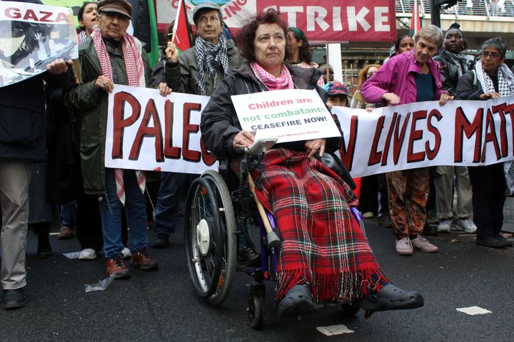 People, holding banners and Palestinian flags, gather to hold a massive pro-Palestine rally in the amid Israeli attacks on Gaza, in London, United Kingdom on October 28, 2023.