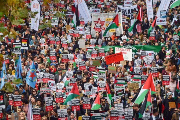 Protesters march with Palestinian flags during the demonstration on Victoria Embankment last month.