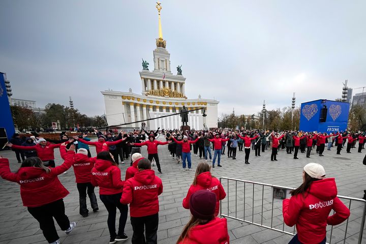 Volunteers perform during opening of the International exhibition "Russia" at VDNKh (The Exhibition of Achievements of National Economy) in Moscow on Saturday, Nov. 4.