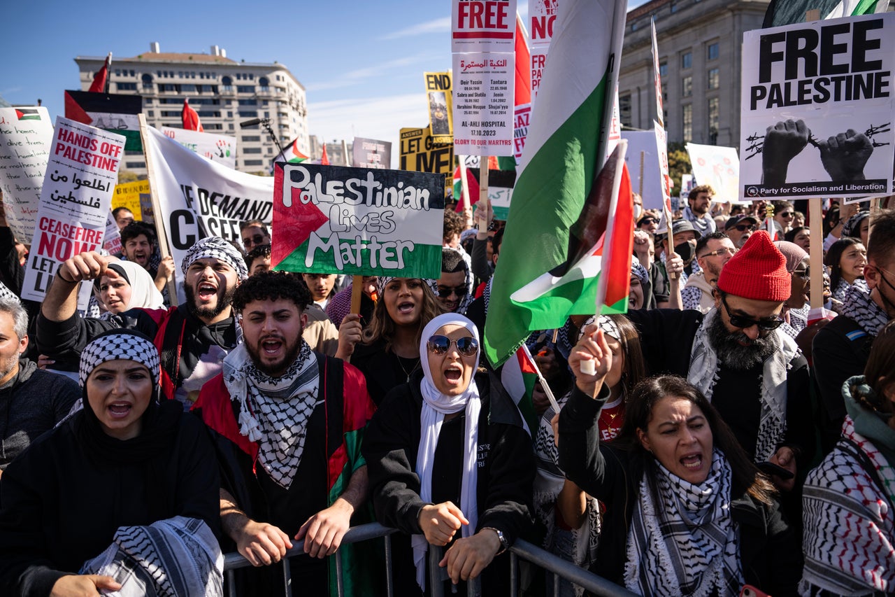 Protesters rally with homemade signs at what organizers are calling a historic rally in Washington, D.C. 