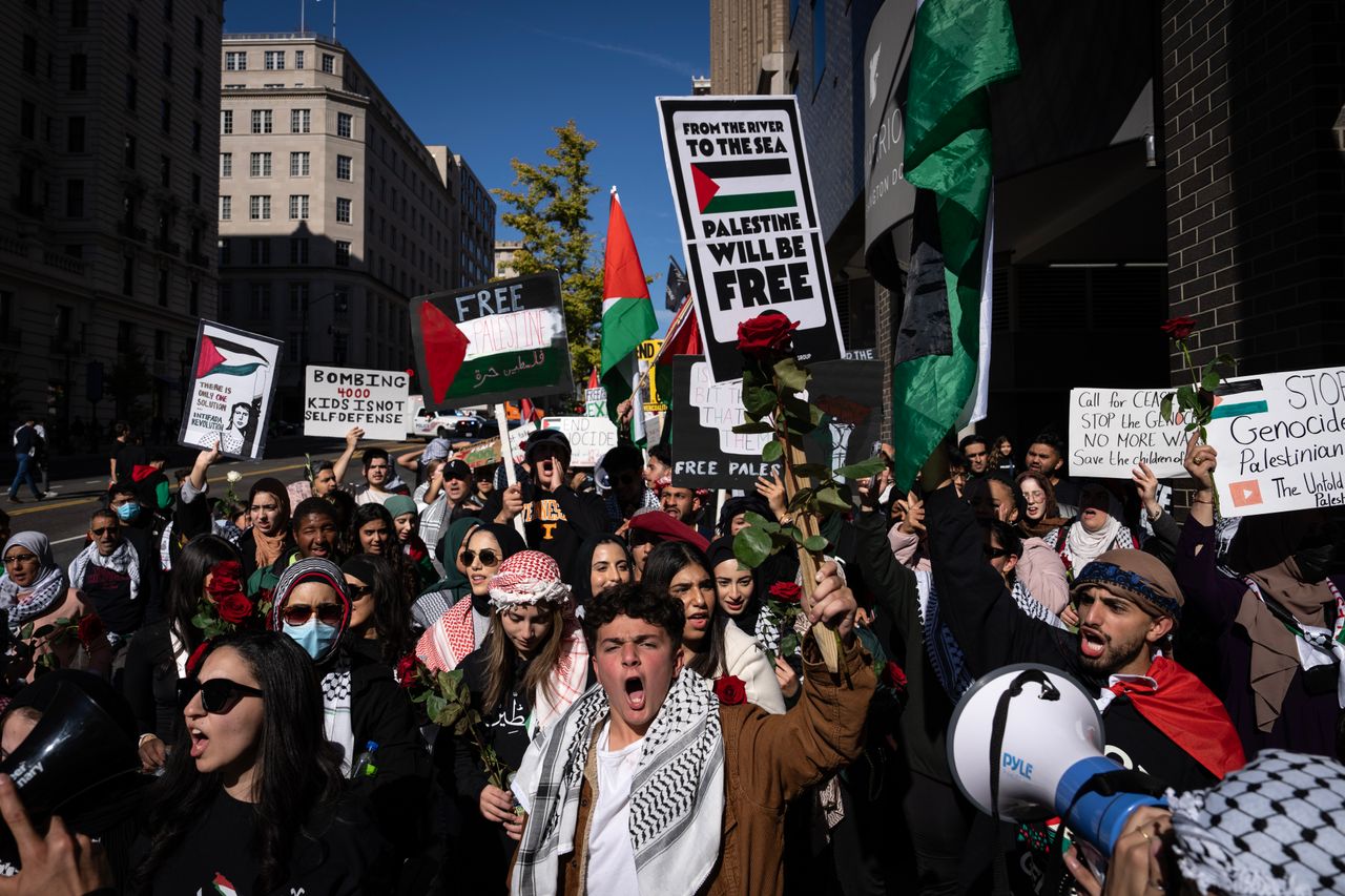 Protesters rally with signs reading, “From the river to the sea, Palestine will be free,” referencing the West Bank along the Jordan River and the Gaza Strip that sits next to the Mediterranean Sea.