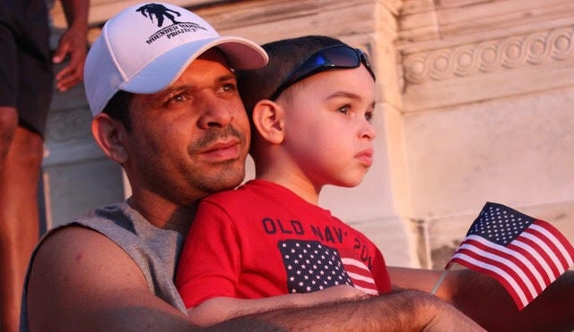 The author celebrating July 4 with his son.