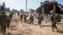 

    Israeli Troops Surround Gaza City, Militants Expected To Fight Street By Street

