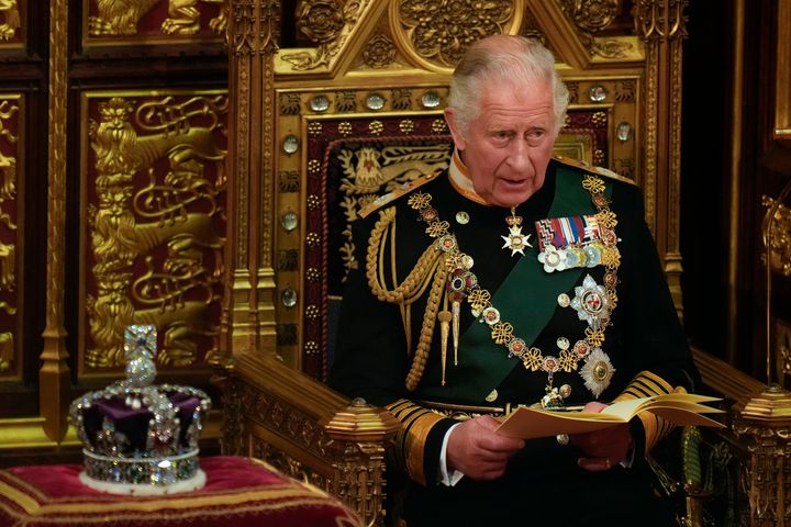 The then Prince Charles reads the Queen's speech next to her Imperial State Crown in may last year.