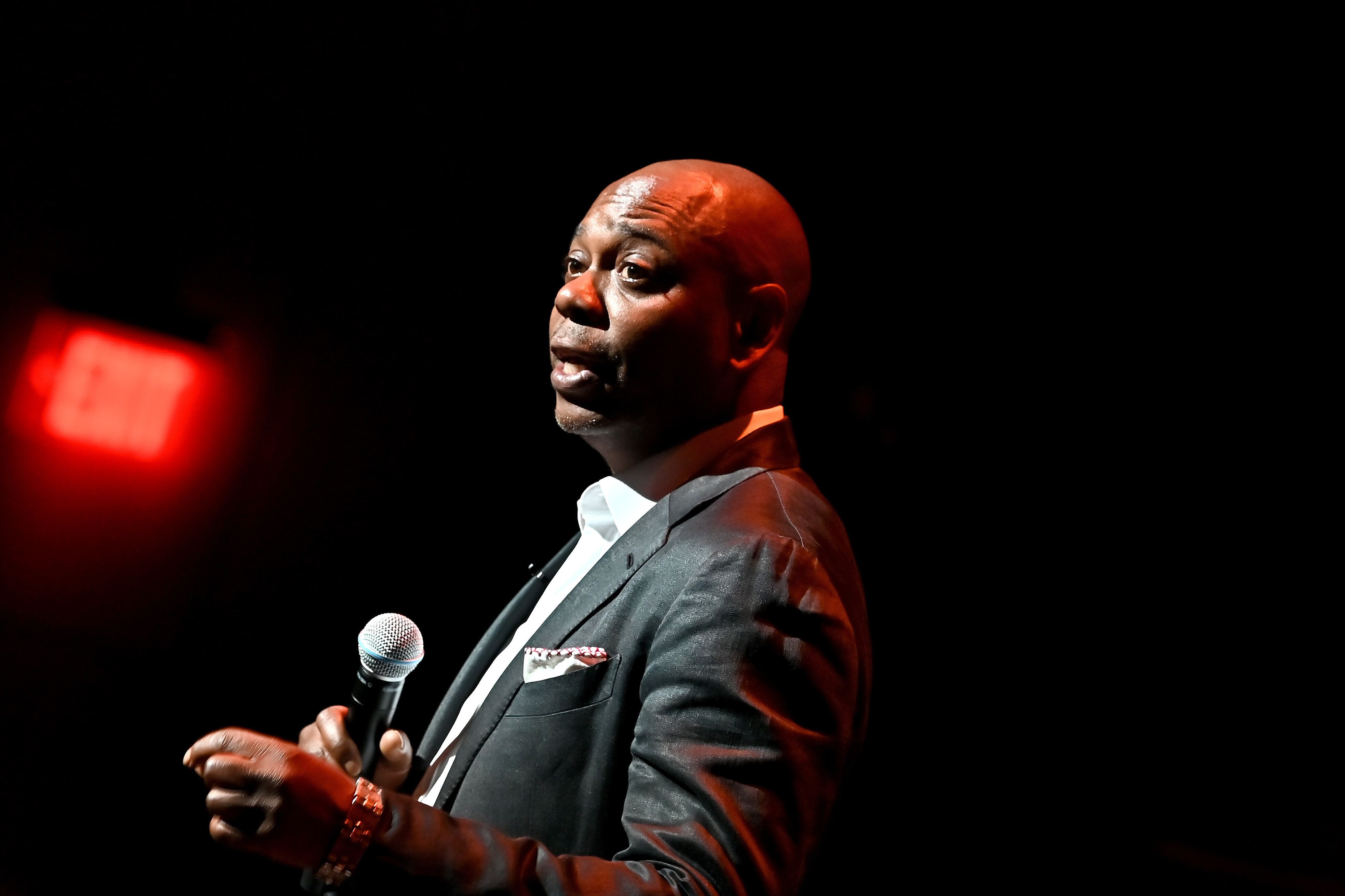 Dave Chappelle performs onstage during the Dave Chappelle theatre dedication ceremony at Duke Ellington School of the Arts on June 20, 2022, in Washington, D.C.
