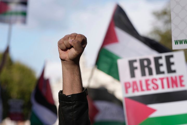 Protesters participate in a pro-Palestinian demonstration in London, Saturday, Oct. 14, 2023.